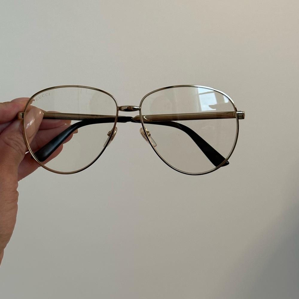 Gucci GG0138s gold transparent glasses